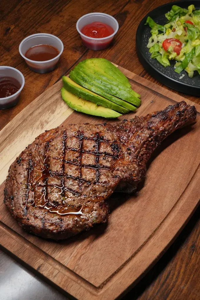 Tomahawk steak with avocado at Sky Lounge
